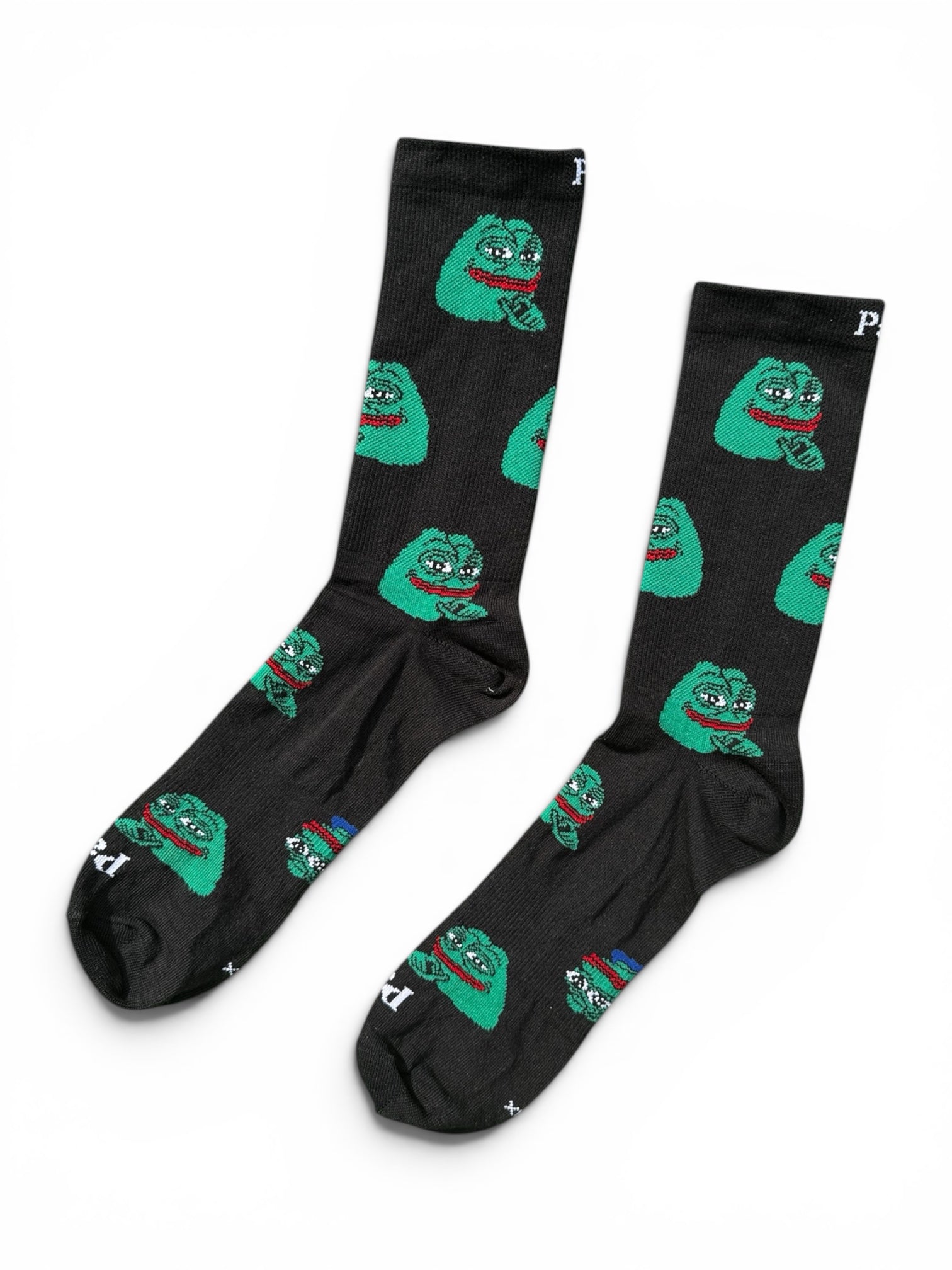 Smug Pepe crew socks close-up showing bold character print, soft combed cotton