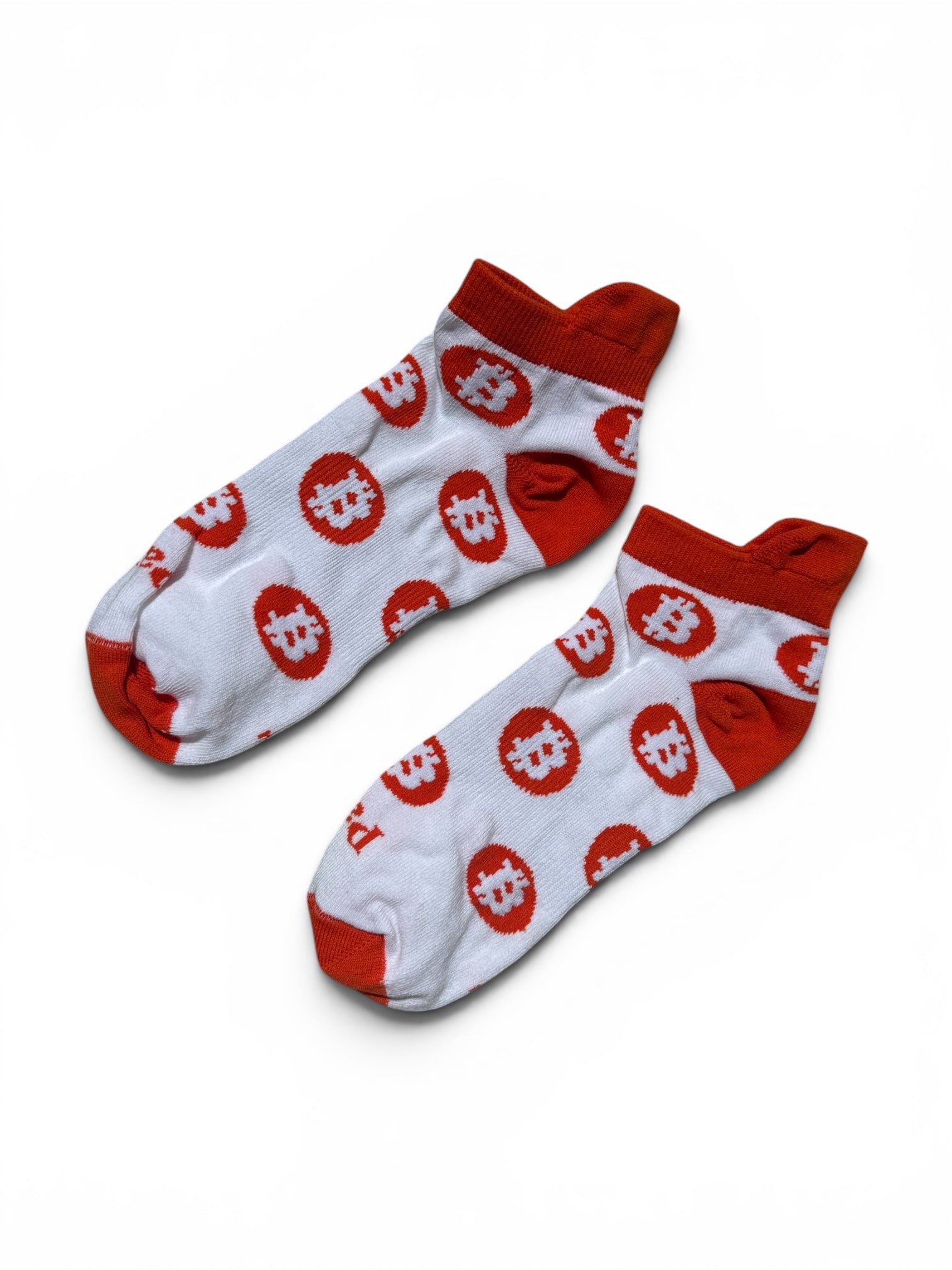 White Bitcoin ankle socks on white background featuring Bitcoin logo design, 100% combed cotton made in USA