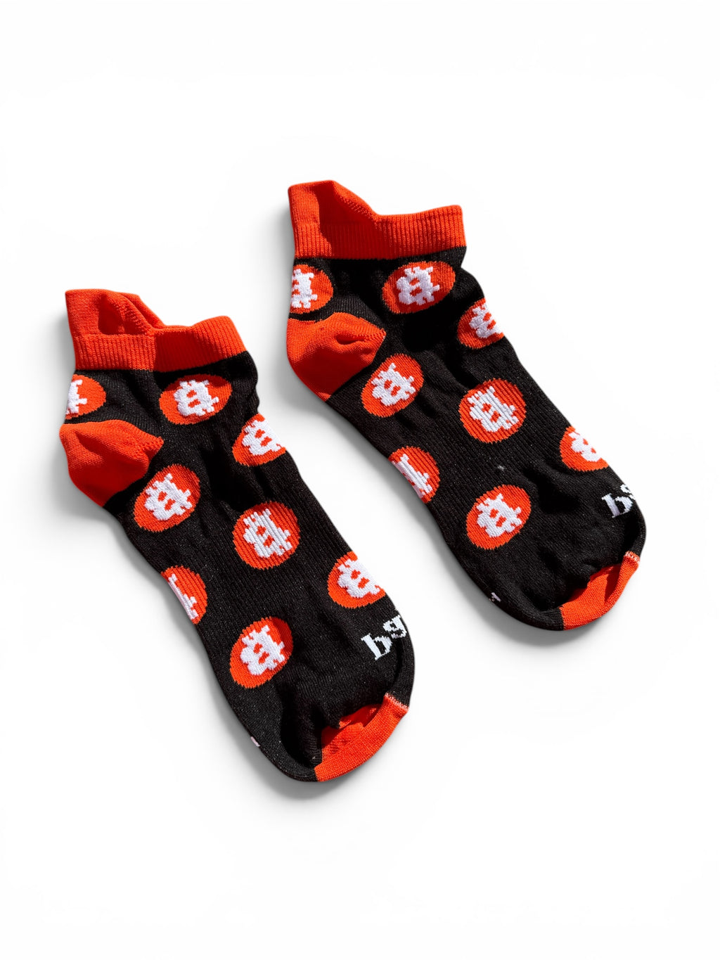 Black Bitcoin ankle socks on white background with Bitcoin logo design, 100% combed cotton made in USA